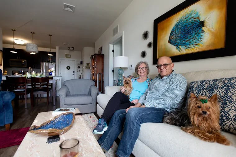 Eleanor "Cookie" and Chuck Adam downsized from a house in Garnet Valley to an apartment in Phoenixville, where they live with their Yorkies, Alfie (left) and Tuffey.