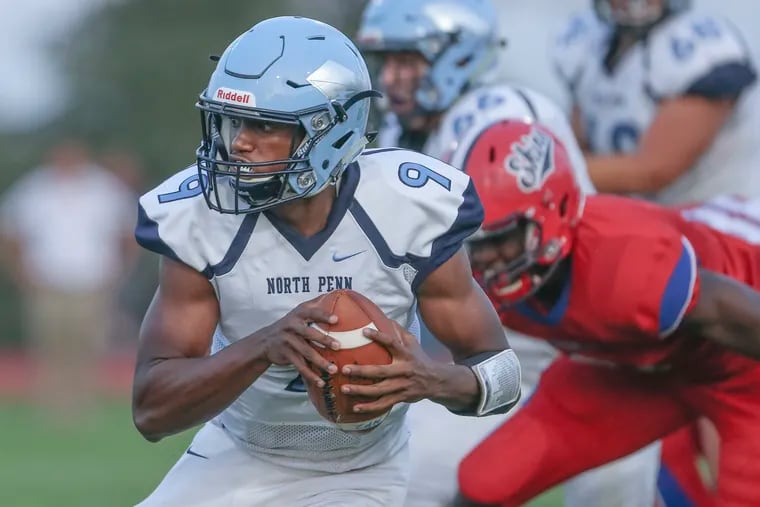 North Penn's quarterback Solomon Robinson is on the move against Neshaminy during the 1st quarter in Langhorne, Friday, August 24, 2018.