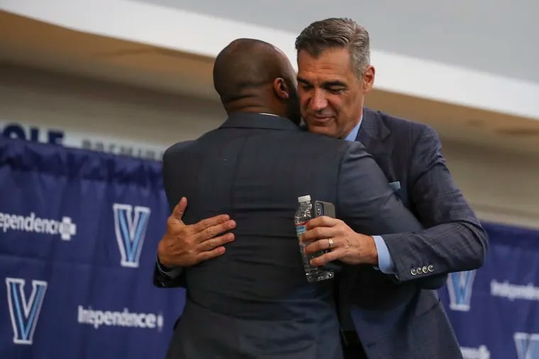 Outgoing longtime Villanova head coach Jay Wright hugs his successor, Kyle Neptune, during a press conference announcing Wright’s retirement and Neptune’s hiring at the Finneran Pavilion in Villanova on Friday, April 22, 2022.