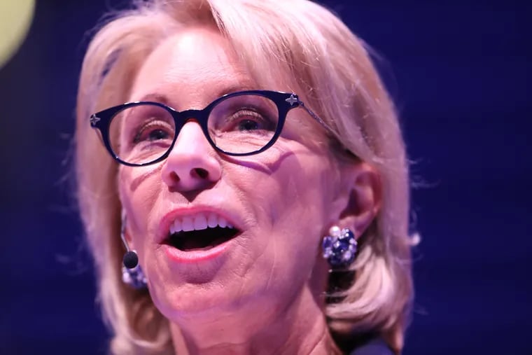 The Department of Education Secretary Betsy DeVos, shown speaking in 2018 at Philadelphia's National Constitution Center, released new guidelines outlining how campuses should handle sexual misconduct allegations on May 6.