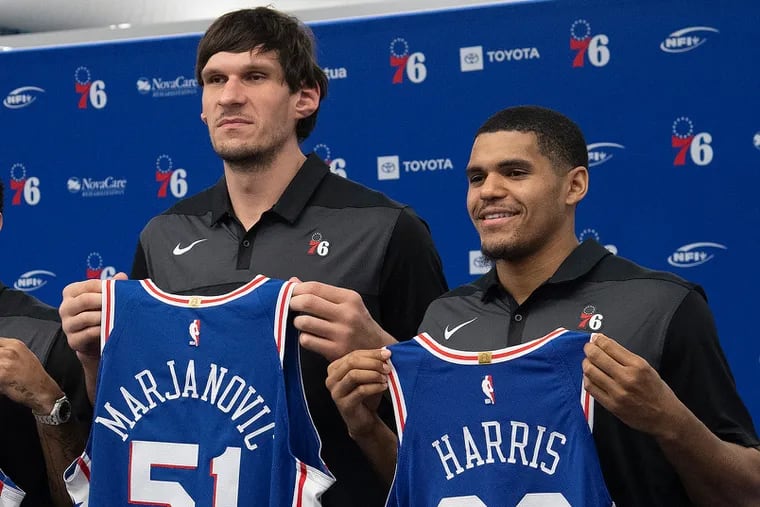 Boban Marjanovic (left) and Tobias Harris were traded to the Clippers together, and then to the Sixers together.