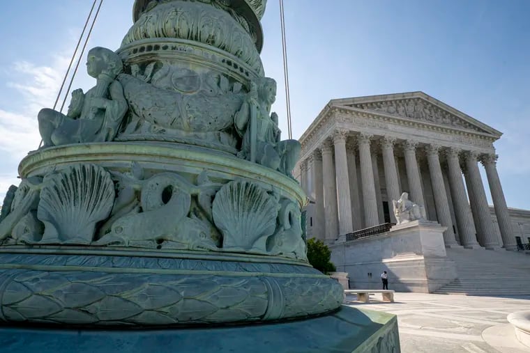 In this June 17, 2019 file photo, the Supreme Court is seen in Washington. The justices will consider later this year Trump administration rules expanding religious, moral exemptions from contraceptive coverage.