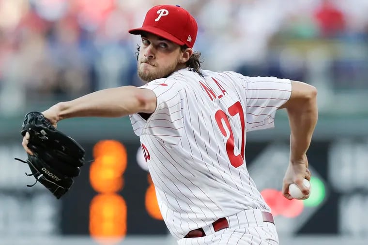 Phillies pitcher Aaron Nola delivers against the Washington Nationals on July 13.