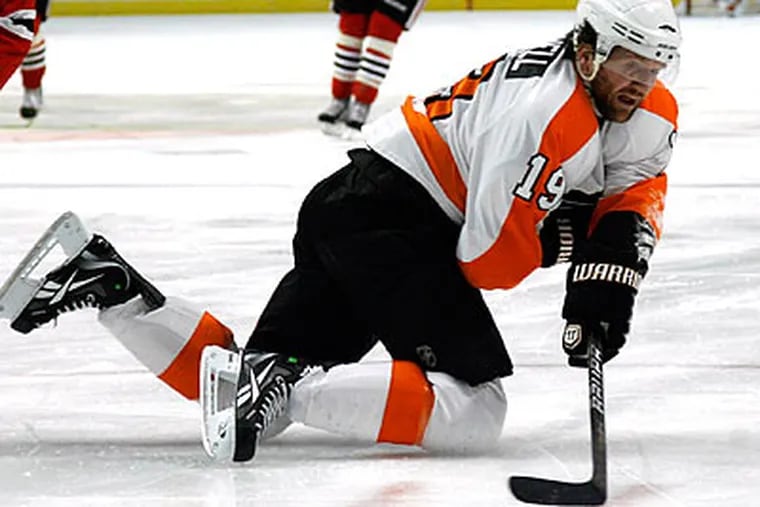 The Flyers moved back into the top spot in the NHL's points race after yesterday's win. (Charles Cherney/AP)