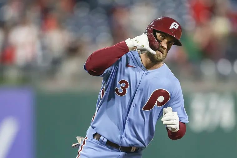 Phillies Bryce Harper rounds third base as he celebrates his solo home run against the Mets during the 4th inning at Citizens Bank Park in Philadelphia, Thursday, May 5, 2022