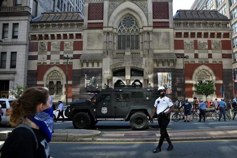 A police armored vehicle passes in front of the Pennsylvania Academy of the Fine Arts (PAFA) as protesters march from the Police Administration Building to their eventual teargassing on I-676 June 1, 2020, as demonstrations continue in the city following the death of George Floyd.