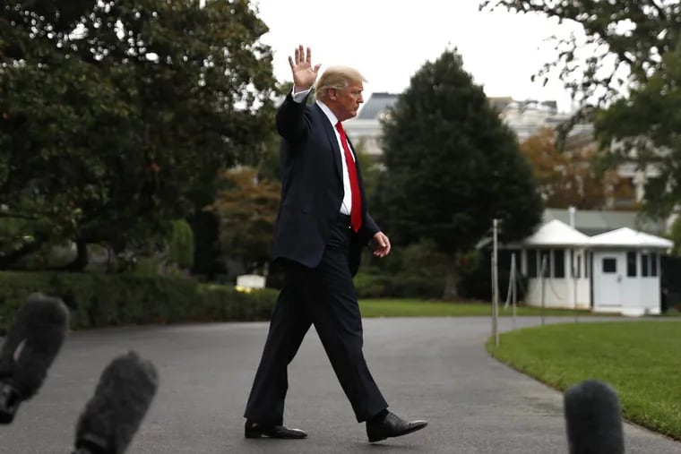 President Donald Trump waves as he walks to board Marine One helicopter on the South Lawn of the White House in Washington, Wednesday, Oct. 11, 2017, for a short trip to Andrews Air Force Base, Md., and then on to Harrisburg, Pa.