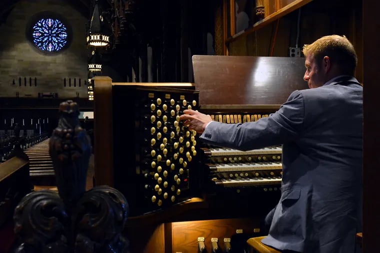 Organist Richard Spotts rehearses on the Aeolian-Skinner Organ at St Pauls Church in Chestnut Hill on Suday February 23,2020.