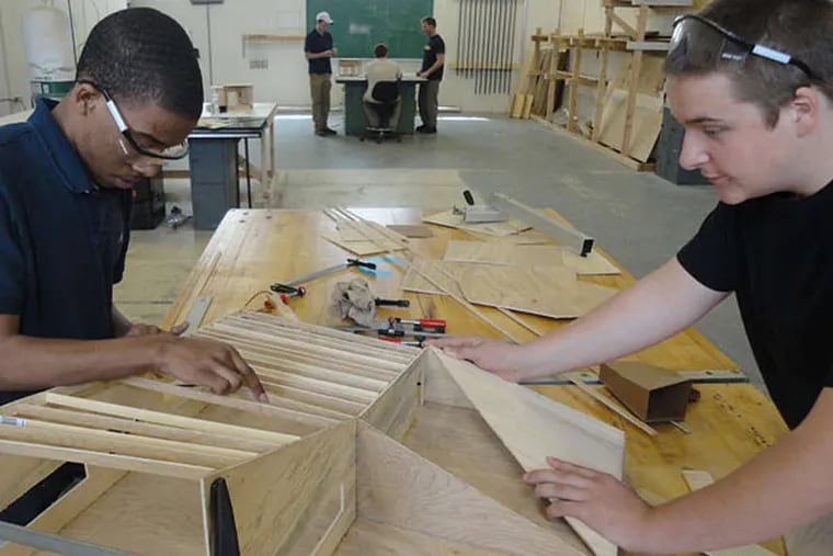It takes everybody: North Carolina high school students Kerron Hayes and Cameron Perry work on a design course in &quot;If You Build It.&quot;