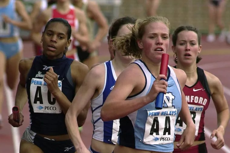 Erin Donohue, then a freshman at North Carolina, leads the pack in the first leg of the women’s distance medley relay at the Penn Relays in April 2002.