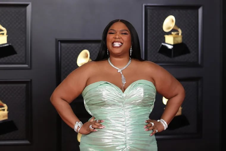 Lizzo on the red carpet at the 63rd Annual Grammy Awards in 2021.