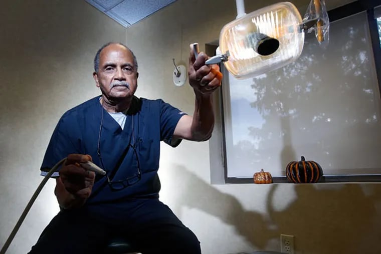 Benjamin Nero, the first African American to graduate from Albert Einstein Hospital's residency program in orthodontics, is writing his memoirs - starting on a cotton farm in Mississippi. (MICHAEL BRYANT/Staff Photographer)