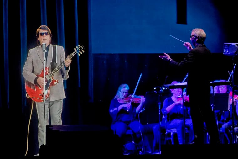 Deceased musical artist Roy Orbison appears to be performing with the Philly Pops, during the Roy Orbison Hologram Tour, the first major hologram tour of its kind, in the Xcite Center theater at Parx Casino in Bensalem in 2018. Workplace holograms would enable employees to virtually re-create in-person meetings whether they're at home or in the office.