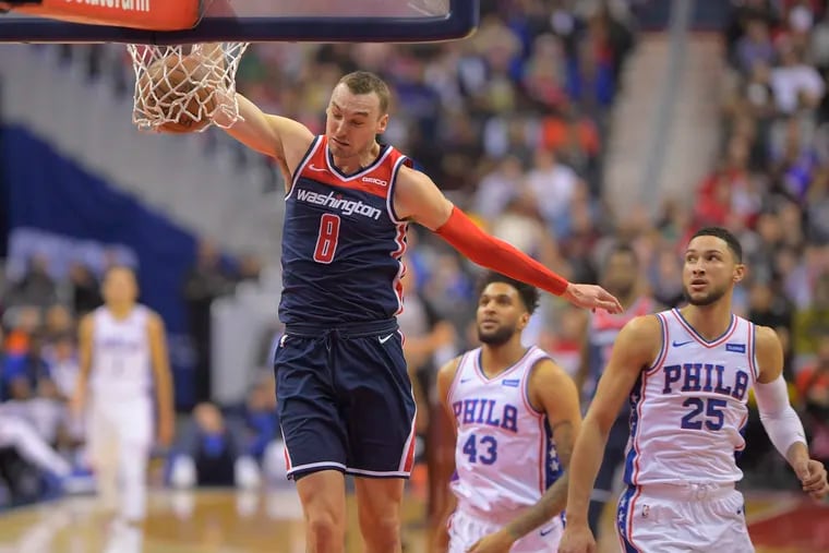 Sam Dekker attacks the rim with authority for two of his 11 points in nearly 19 minutes of action in the Wizards' 123-106 win over the 76ers on Wednesday night. MUST CREDIT: Washington Post photo by John McDonnell