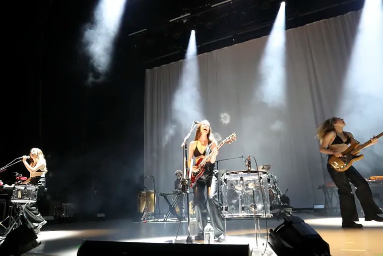 Haim performs during the One More Haim tour at the Mann Center on Saturday.
