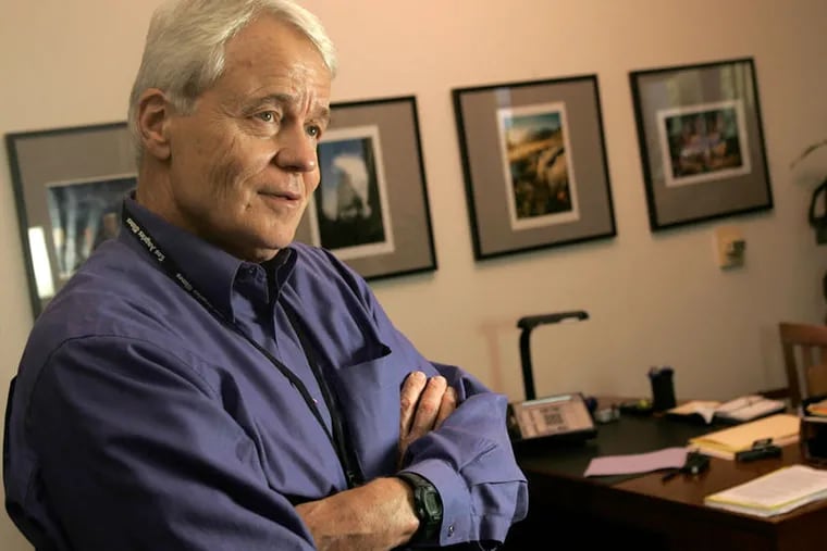John Carroll is shown in 2005 in his office at the Los Angeles Times, where he was editor for five years.