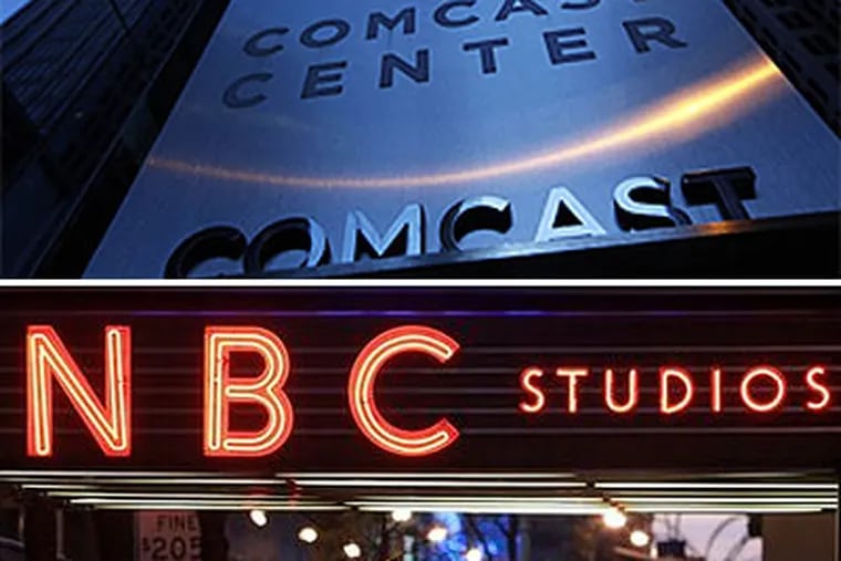 The Comcast Center in Philadelphia and NBC Studios in New York City are pictured here. Comcast will take over NBC Universal at midnight. (AP Photos)