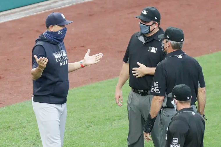 Yankees manager Aaron Boone complained to the umpires about Phillies fans using an air horn outside the center field gate during Thursday's game.