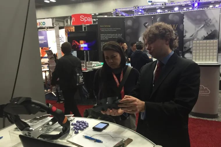 Gregory Hanuschak showed off his &quot;after-market&quot; SafeConnect car-smartening device in the Philly zone at the SXSW trade show in Austin, Texas.