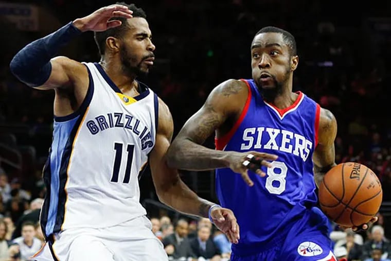 Philadelphia 76ers guard Tony Wroten (8) drives past Memphis Grizzlies guard Mike Conley (11) during the second half at Wells Fargo Center. The Grizzlies defeated the 76ers 120-115. (Bill Streicher/USA Today)