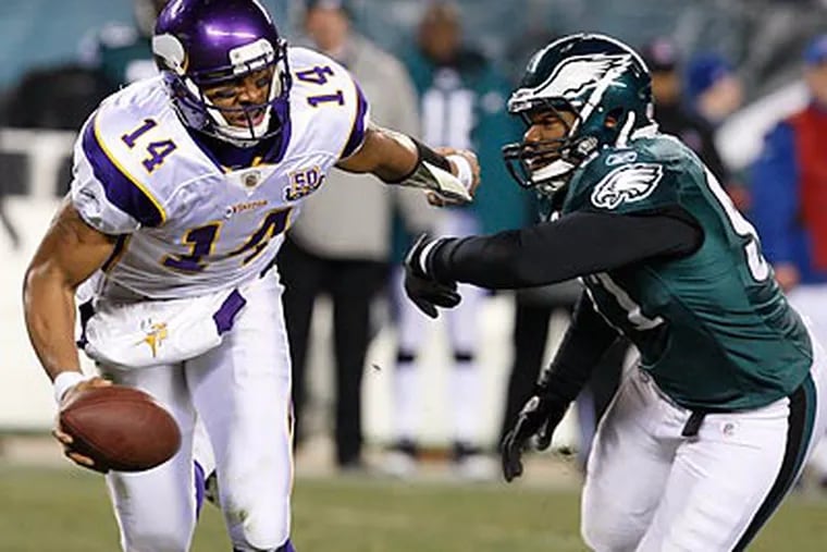 Vikings quarterback Joe Webb carved up the Eagles' defenese with his arm and with his feet. (Ron Cortes/Staff Photographer)