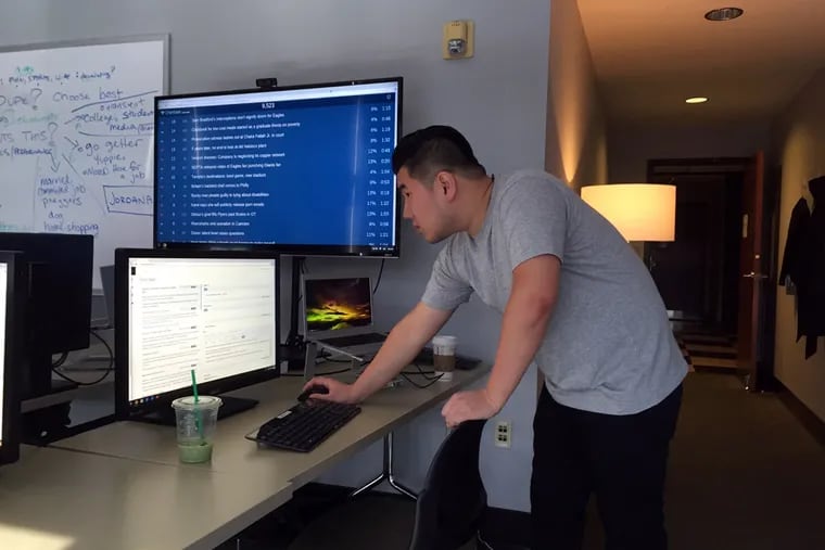 Drexel student Zunteng Lin reviews a story on his work station in the purpose-built app curation lab at Drexel’s LeBow College of Business.