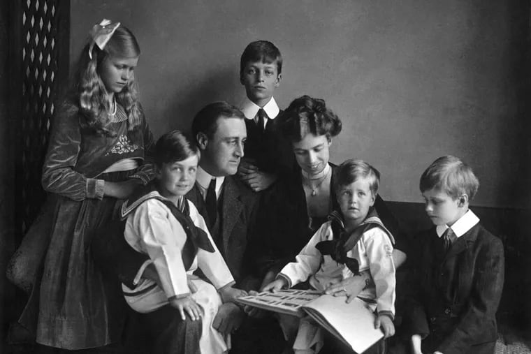 In this June 12, 1919 photo provided by PBS, Franklin and Eleanor Roosevelt pose for a portrait with their children in Washington.