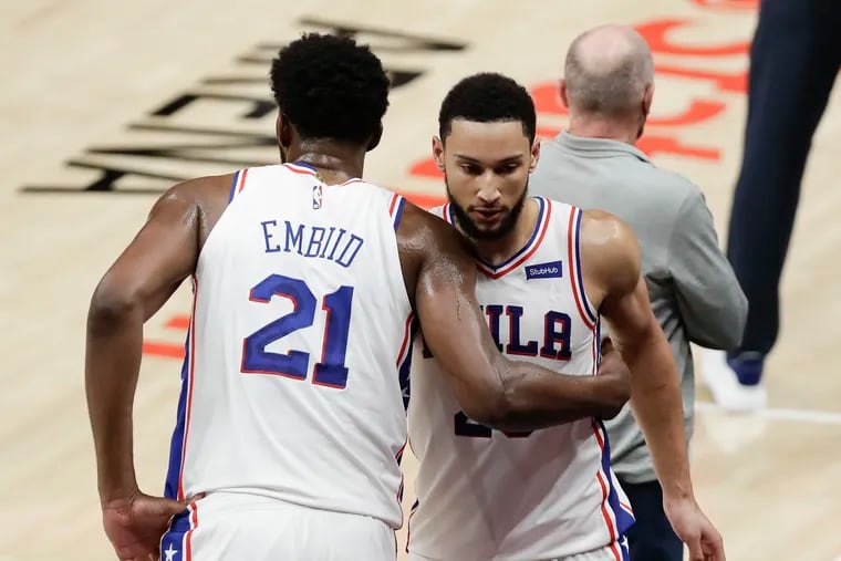Sixers center Joel Embiid and guard Ben Simmons embraced after getting replaced late in the fourth quarter against the Atlanta Hawks in Game 3 of the NBA Eastern Conference semifinals.