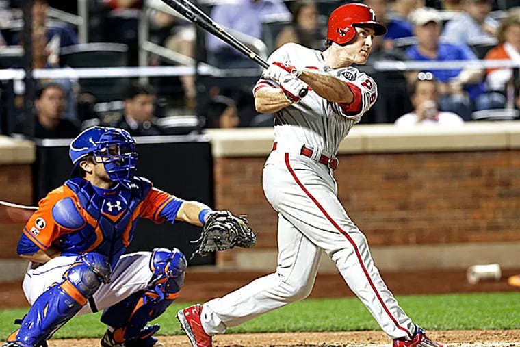 Phillies second baseman Chase Utley hits a grand slam in the seventh inning. (Frank Franklin II/AP)