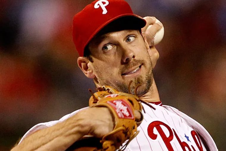 Phillies pitcher Cliff Lee delivers against the Braves on Sunday, August 4,
2013. (Ron Cortes/Staff Photographer)