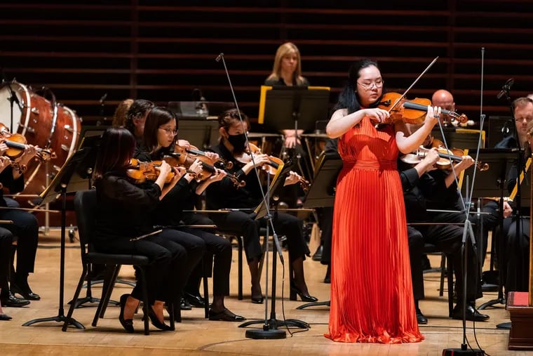 Violinist Beatrice Chen performing with the Philadelphia Orchestra at its family concert Saturday, the first live one in two and a half years, in Verizon Hall.