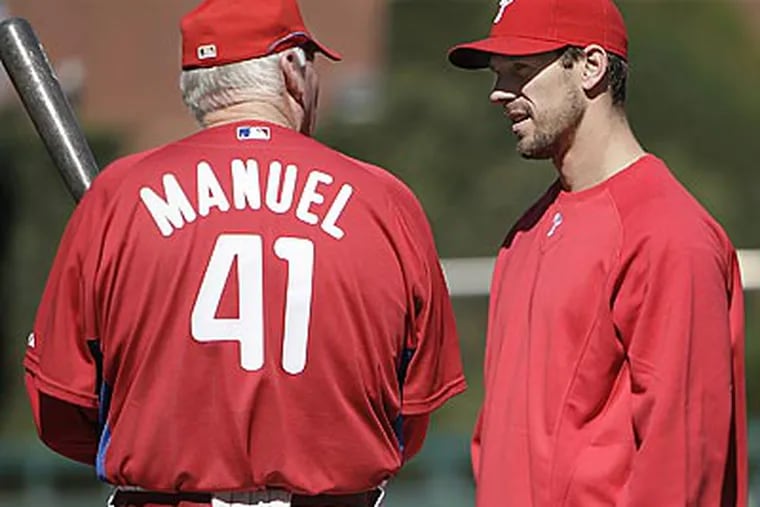 Cliff Lee (right) will be the Phillies' starting pitcher in Game 1 of the National League Division Series against the Colorado Rockies this afternoon. (David Maialetti/Staff Photographer)