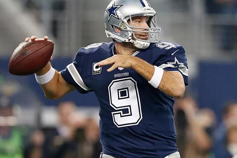 Dallas Cowboys quarterback Tony Romo (9) throws in the pocket against the Philadelphia Eagles at AT&T Stadium. (Matthew Emmons/USA Today)