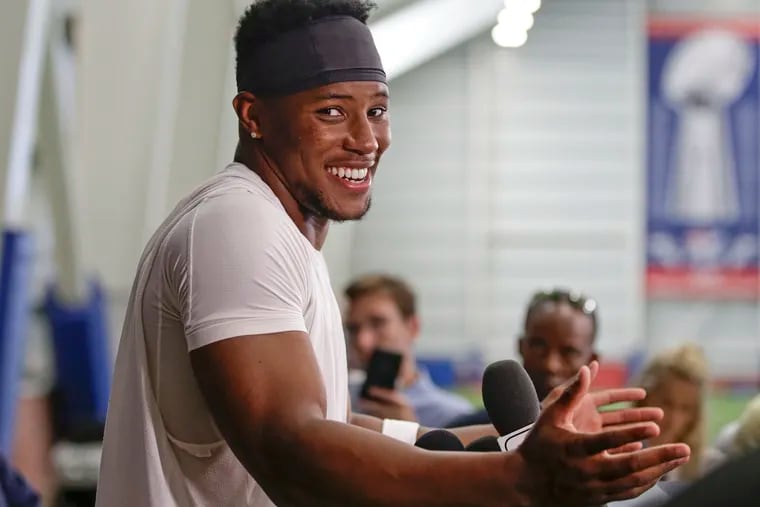 New York Giants running back Saquon Barkley speaks during a news conference after practice with teammates at the NFL football team's training camp in Thursday, July 25, 2019, in East Rutherford, N.J.
