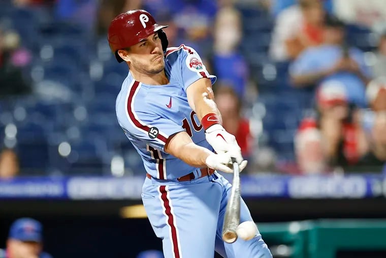 J.T. Realmuto delivered a game-tying two-run single after Bryce Harper drew a walk in the fourth inning of Thursday night's wild 17-8 Phillies victory over the Chicago Cubs at Citizens Bank Park.