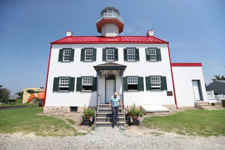 Nancy Patterson, of the Maurice River Historical Society at the East Point Lighthouse. The Maurice River Historical Society undertook a massive $850,000 project to completely restore the beloved lighthouse to its early grandeur — refurbishing it inside and out to look the way it did when a lighthouse keeper was in residence. Now the oft photographed and painted landmark will re-open  to visitors next month.
