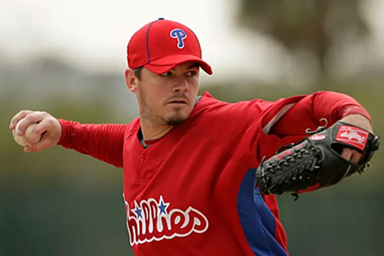 Phillies' pitcher Chad Durbin pitches during Spring Training workouts. (Yong Kim / Staff Photographer)