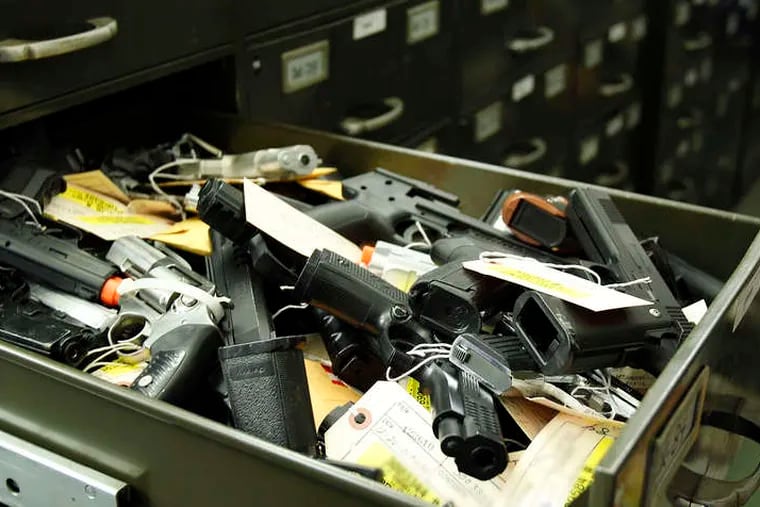 File cabinets inside the Gun Room at City Hall are stuffed with scores of pistols and handguns, all confiscated in crimes commited in Philly.