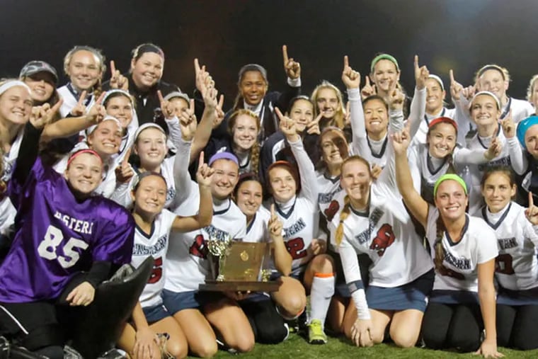 The Eastern field hockey team celebrates after winning the Tournament of Champions title game. (Elizabeth Robertson/Staff Photographer)