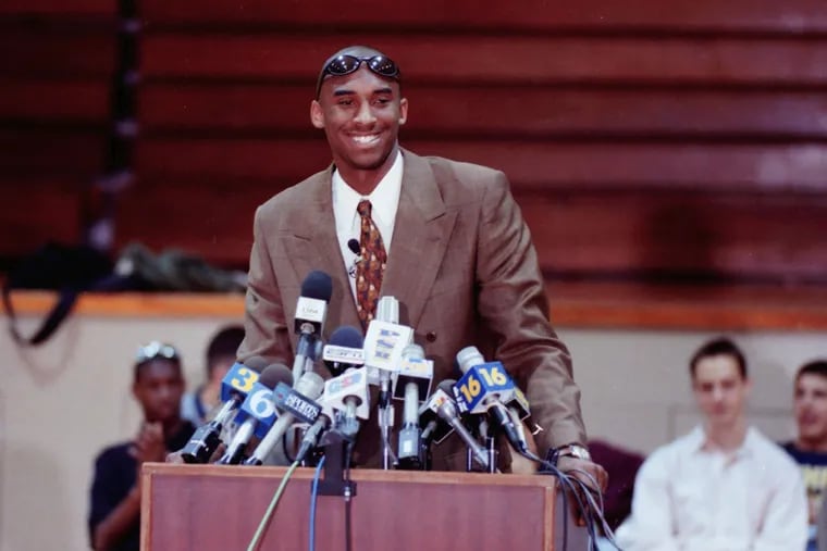 Kobe Bryant on the day he announced he was giving up his eligibility to play college basketball and would head straight to the pros. The news conference was held at at Lower Merion High School in April 1996, the gymnasium was packed with students. "Literally every single person loved Kobe," classmate Audrey (Price) Gornish said. "I don't think that guy had one enemy. Really. He was kind to every single person in that entire school."