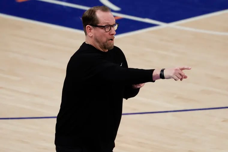 Sixers head coach Nick Nurse points to his team against the New York Knicks during the first quarter in game one of the first round of the NBA Eastern Conference playoffs at Madison Square Garden in New York on Saturday, April 20, 2024