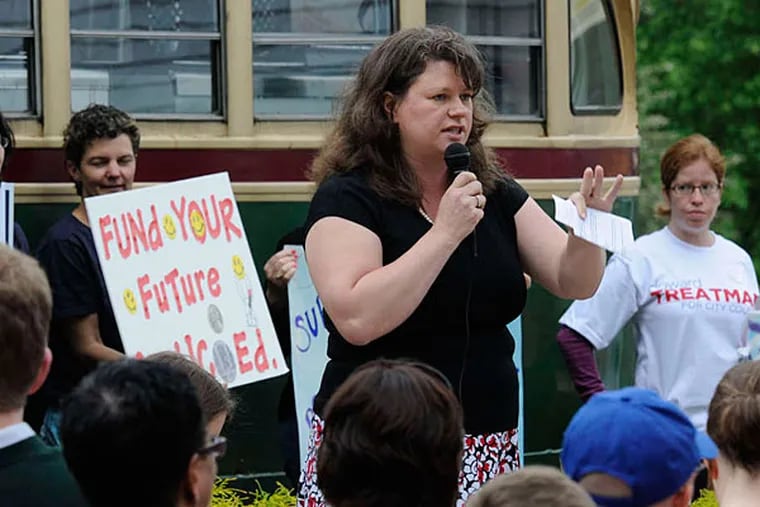 Susan Gobreski, executive director of Education Voters Pennsylvania, led a rally in Harrisburg last week demanding more - and more equitable - school funding. She is pictured at a 2011 rally in Mount Airy. (RON TARVER / File  Photograph)