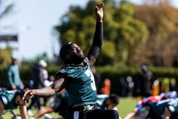 Eagles wide receiver Zach Pascal (3) stretches during practice at the Novacare Complex on Friday.