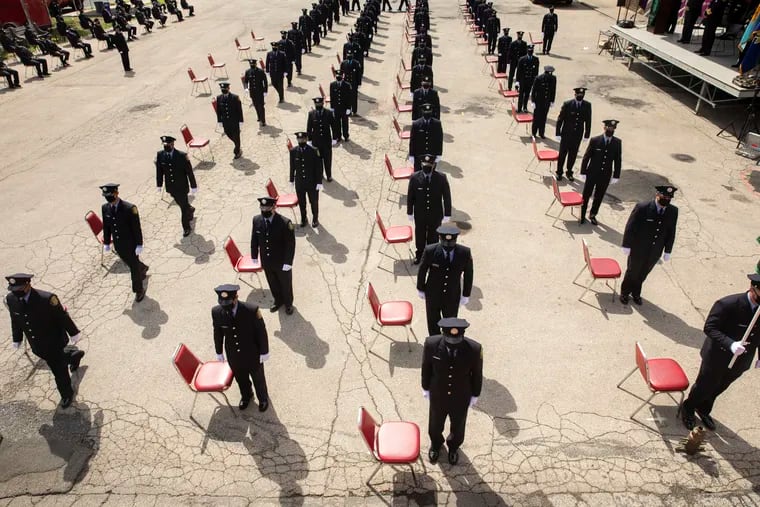 Seats for cadets were spread apart for social distancing during a graduation of 64 members of Class 197 at the Philadelphia Fire Academy in Philadelphia, Pa. on Monday, July 13, 2020.