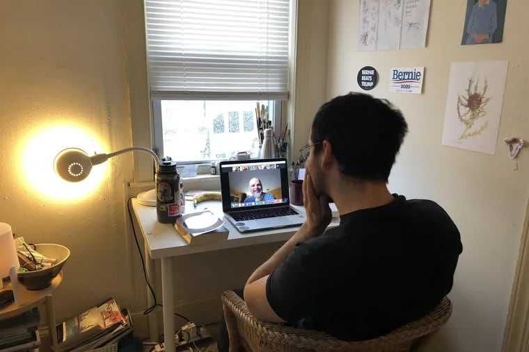 Jacob Hershman, a University of Pennsylvania senior, takes his first class online from his off-campus apartment in Philadelphia.