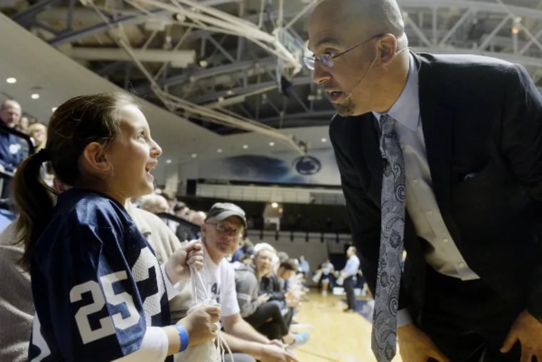 James Franklin greets Sofia Peters, 7, during the event to mark the school's signing day. (AP)