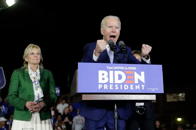 Democratic presidential candidate Joe Biden with his wife Jill during a Super Tuesday election night rally in Los Angeles on March 3, 2020.