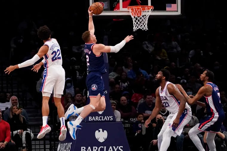 Brooklyn Nets forward Blake Griffin goes to the basket past Sixers guard Matisse Thybulle during Philly's 114-105 loss.