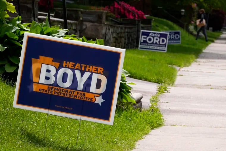 Campaign signs for Heather Boyd and Katie For in Aldan on on May 4. The two are running in a special election in the Philadelphia suburbs.