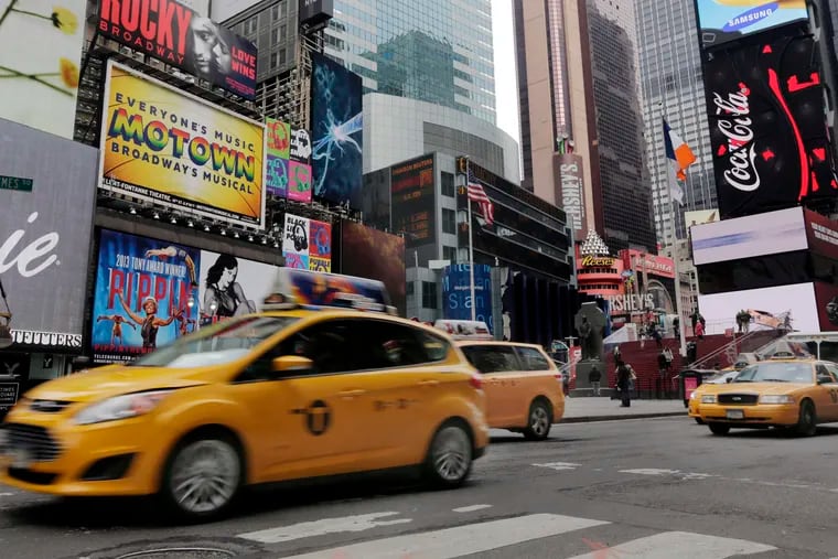 A New York man who talked about wanting to throw a grenade in Times Square has been arrested and is expected to be arraigned Friday on weapons-related charges, law enforcement officials told The Associated Press.